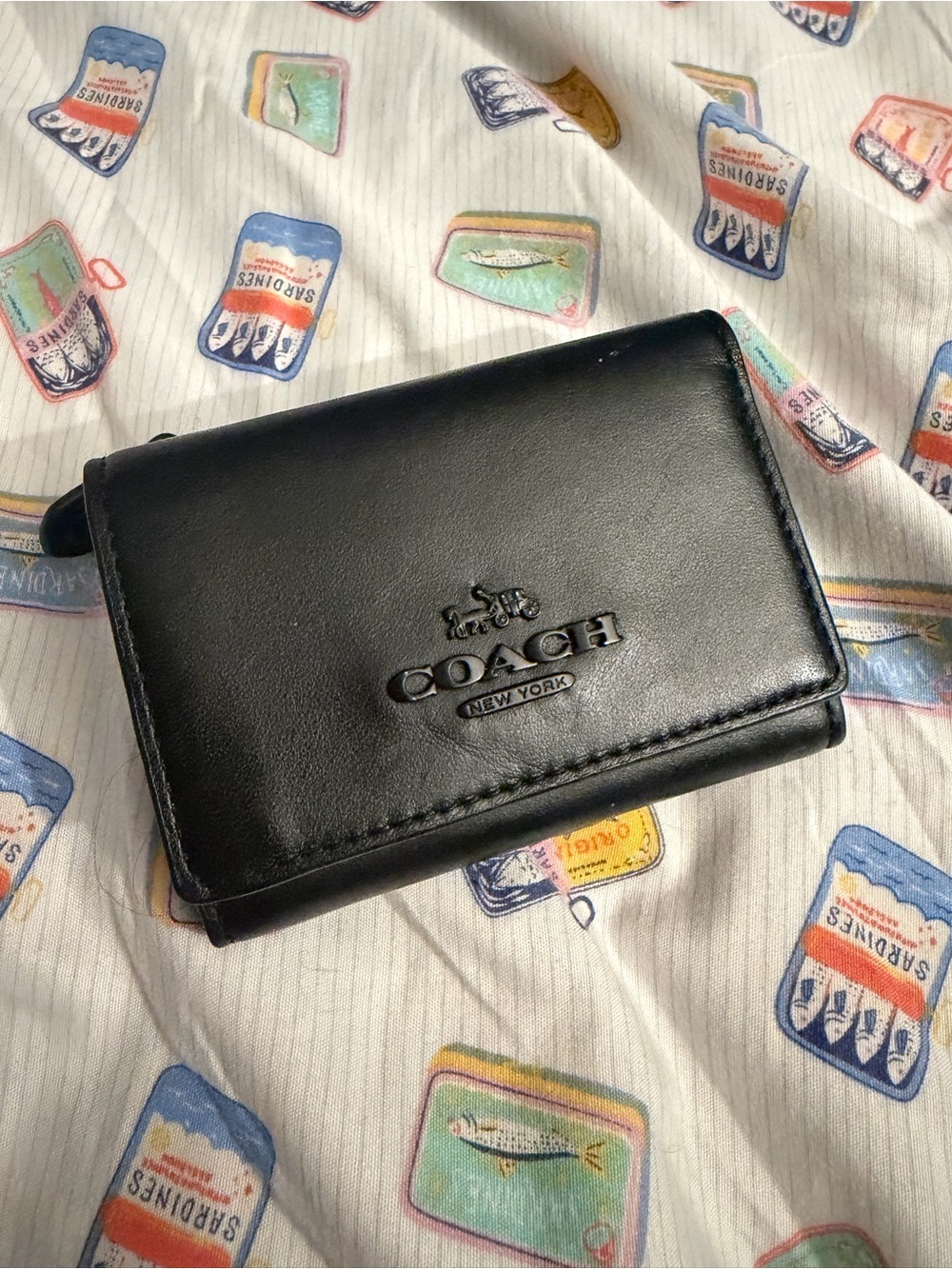 Coach Black Leather Trifold Wallet with Embossed Logo